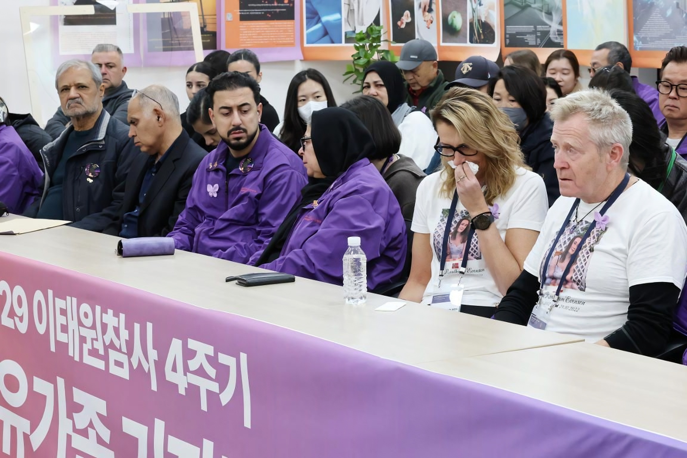 Families of foreign Itaewon victims say footage from final moments shows police absence