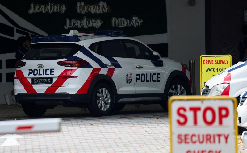 Teen arrested over Singapore school bomb threat, police say