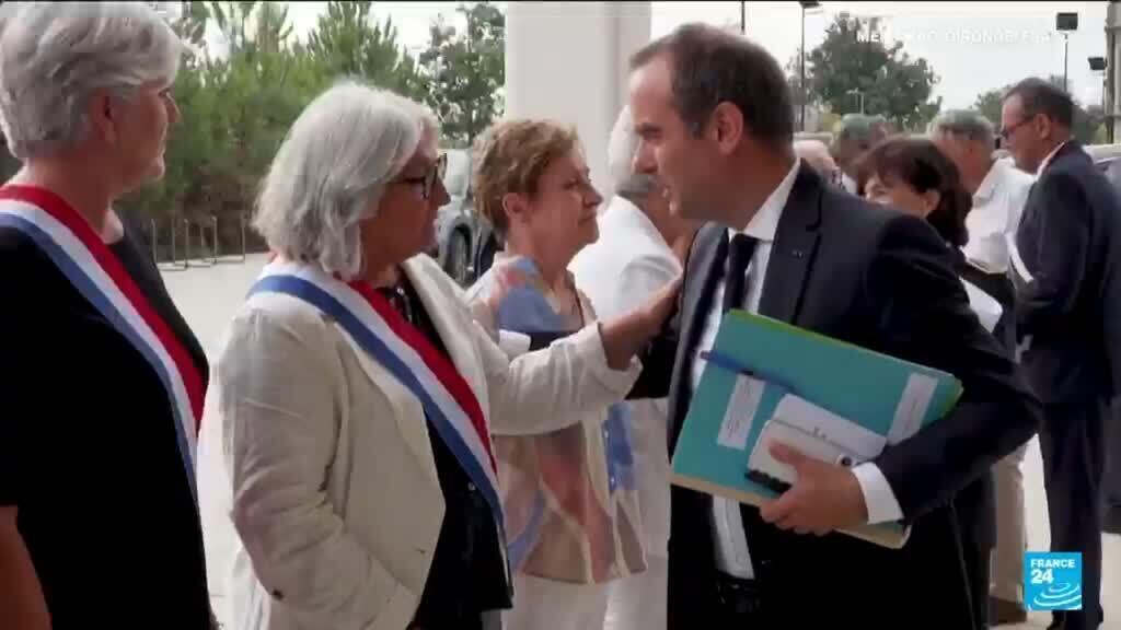 French PM announces support for fire-damaged villages after jeers from residents