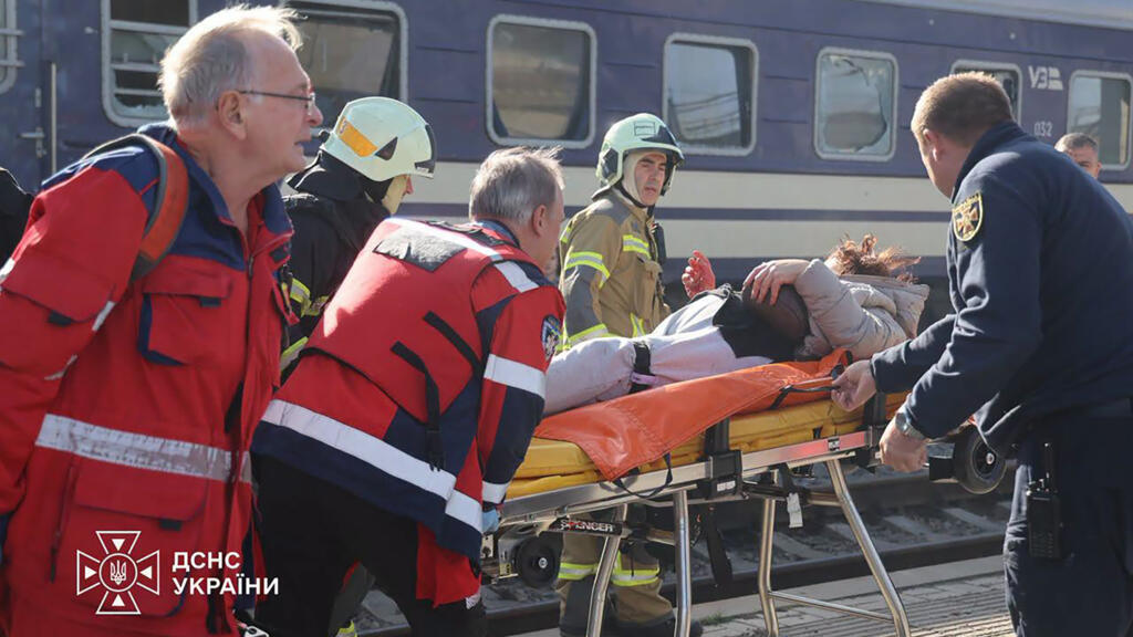At least 13 killed in 'horrific' Russian drone strike at Ukraine train station
