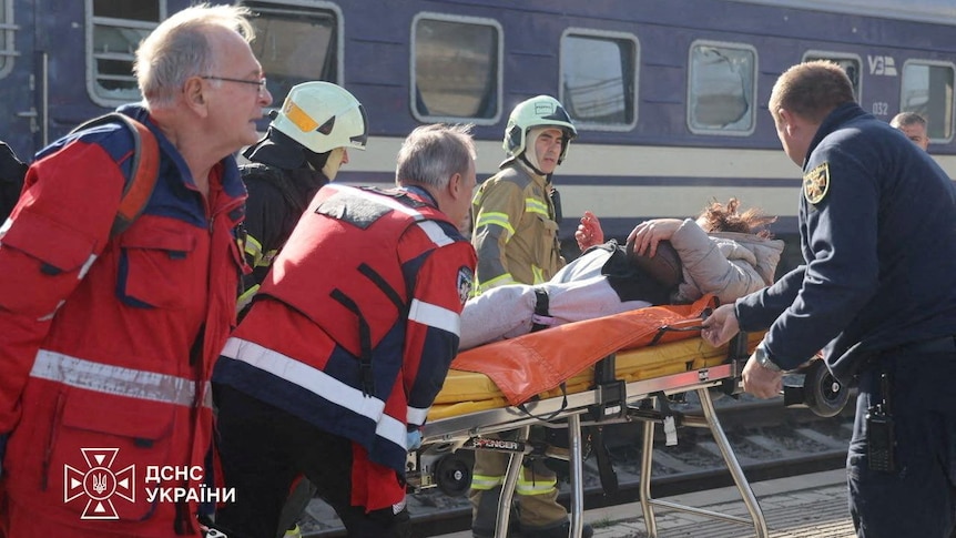 Russian drone strike on Ukrainian train platform kills 14