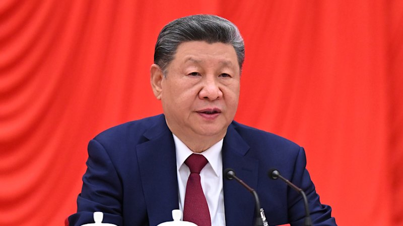 Empty chairs and a shock promotion as Xi warns purges will continue