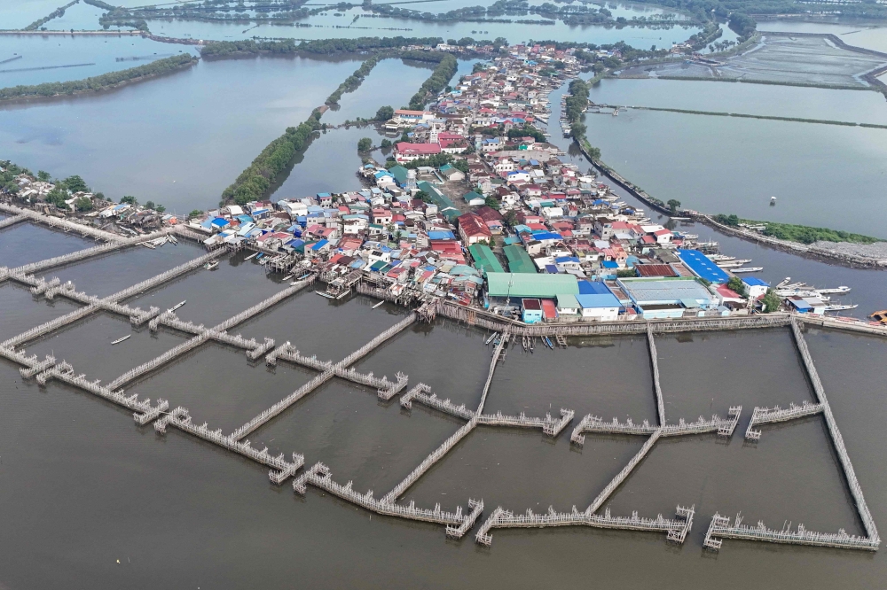 Bamboo and oyster shells: Philippine island fights rising seas with nature, not concrete