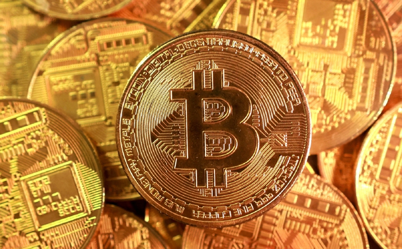 Bitcoin, cryptocurrency prices fall after Binance reports security issue