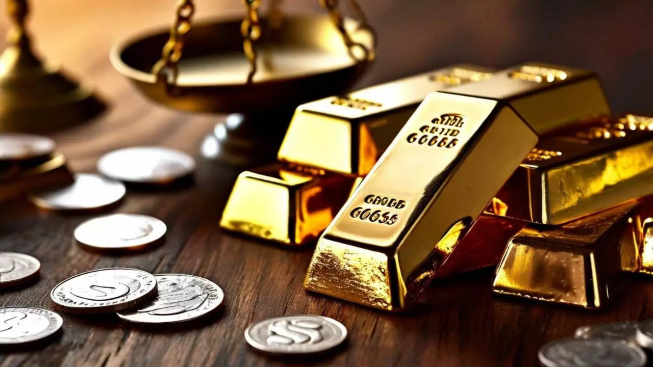 Gold hits one-year low, silver slips below $50 as inflation fears bite