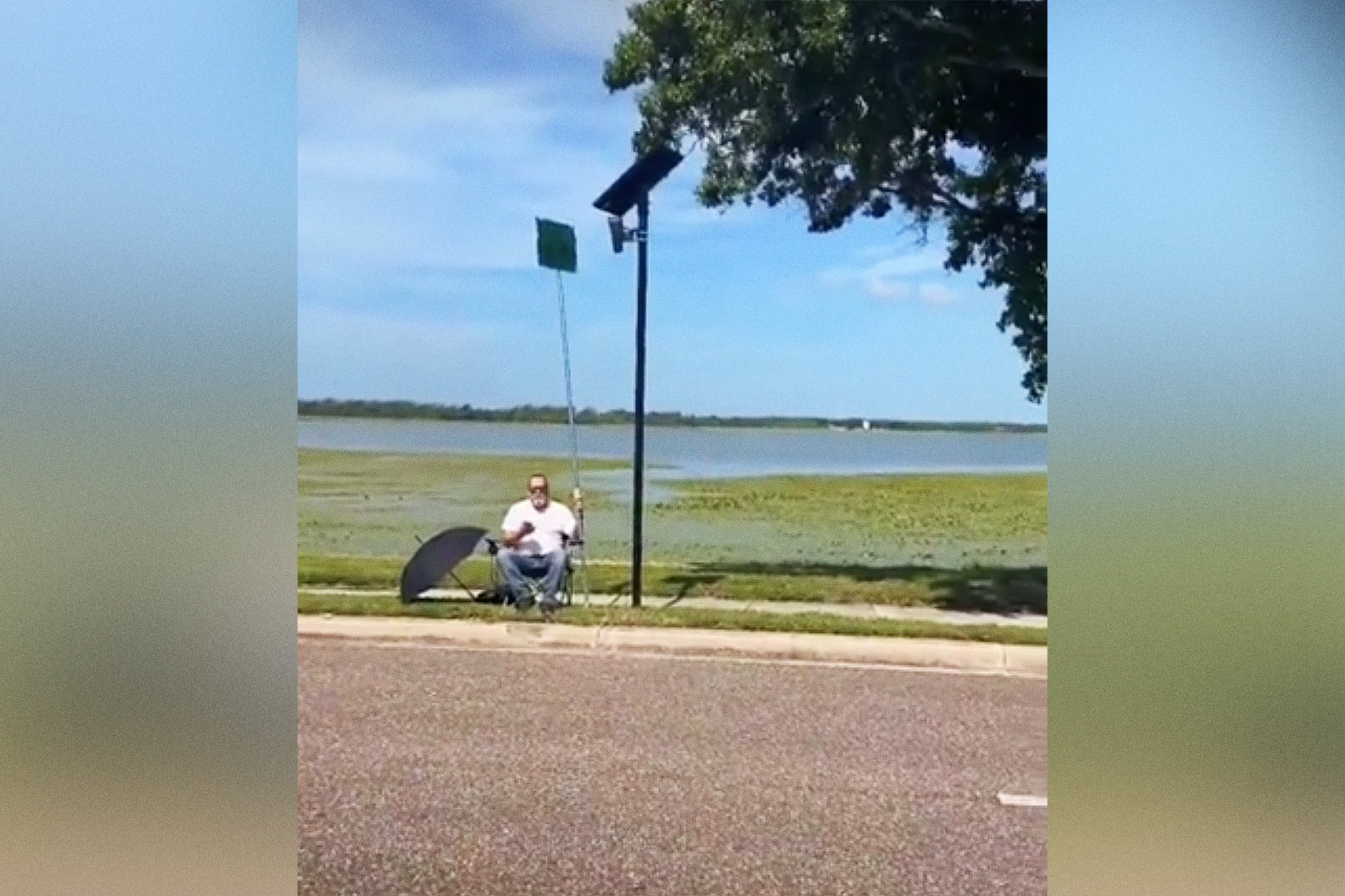 Wild Footage Shows Man Blocking Flock Camera With Comically Gigantic Protest Sign