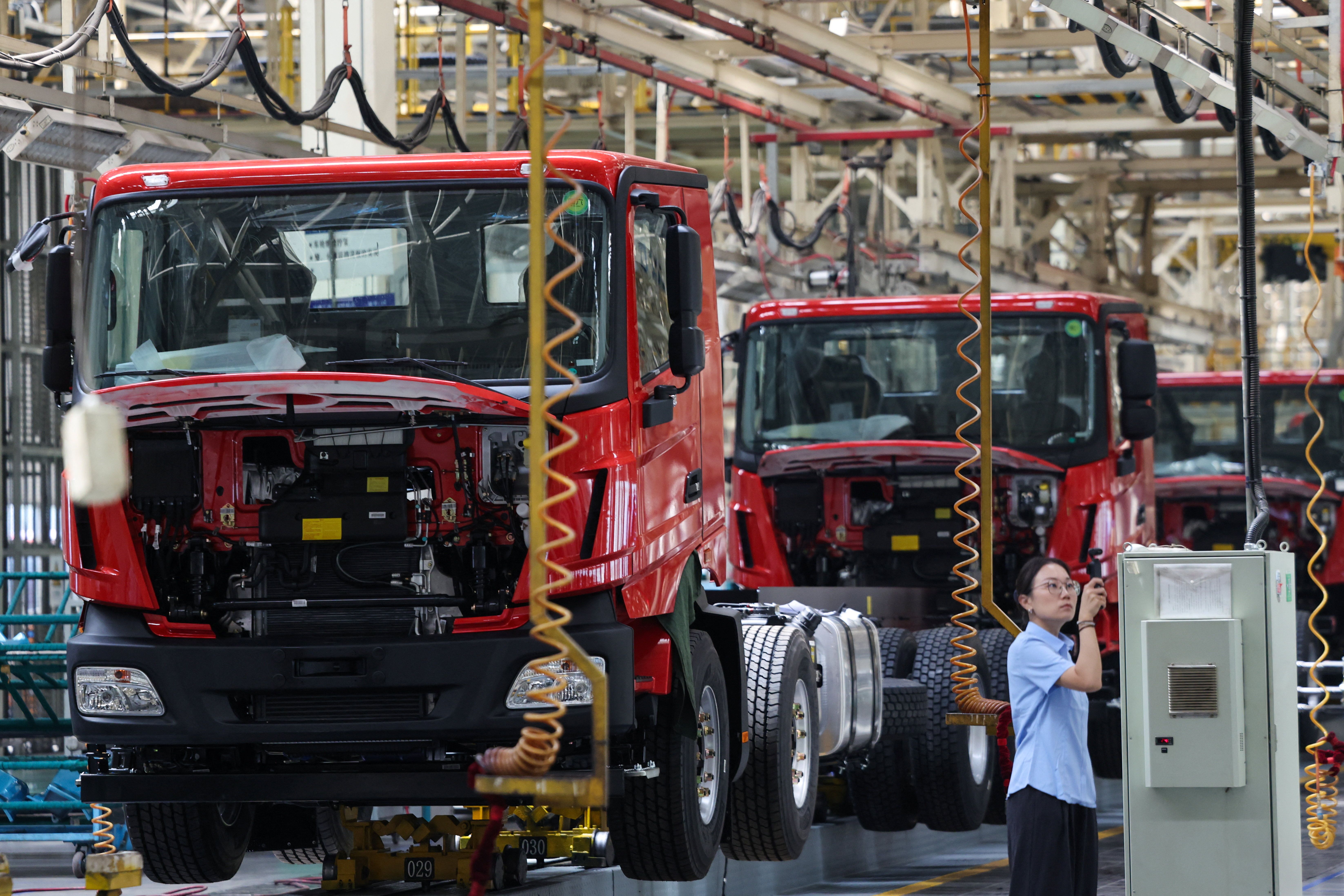 China's factory output contracts unexpectedly