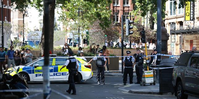 Woman arrested after four men stabbed in central London