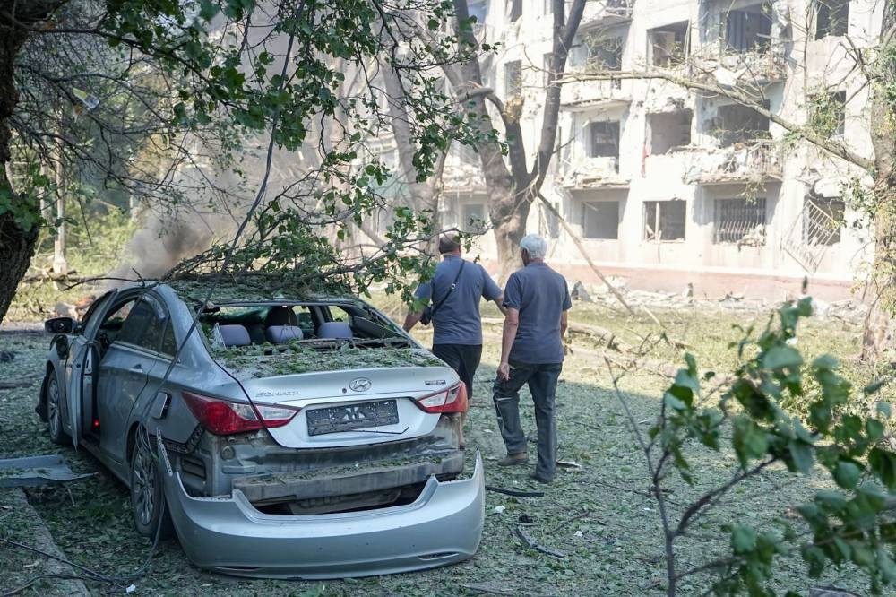Russian attacks kill 10 in Kharkiv as Ukrainian drones hit Moscow