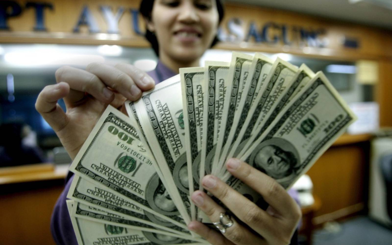 Dollar drifts near multi-month lows as Treasury yields ease
