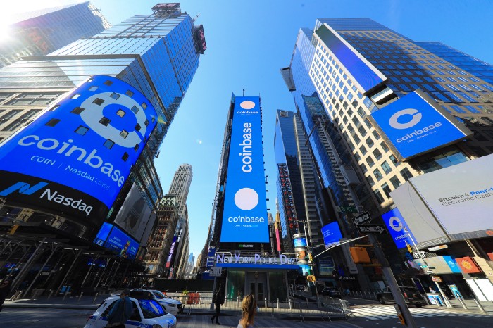 Coinbase shares slide as revenue and earnings miss despite record market share