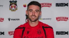 Wrexham sign Preston captain Whiteman