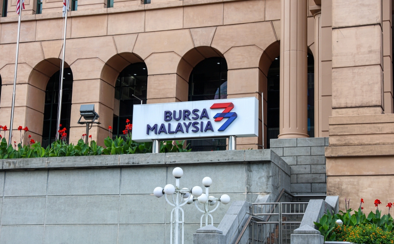 Bursa Malaysia remains lower at midday