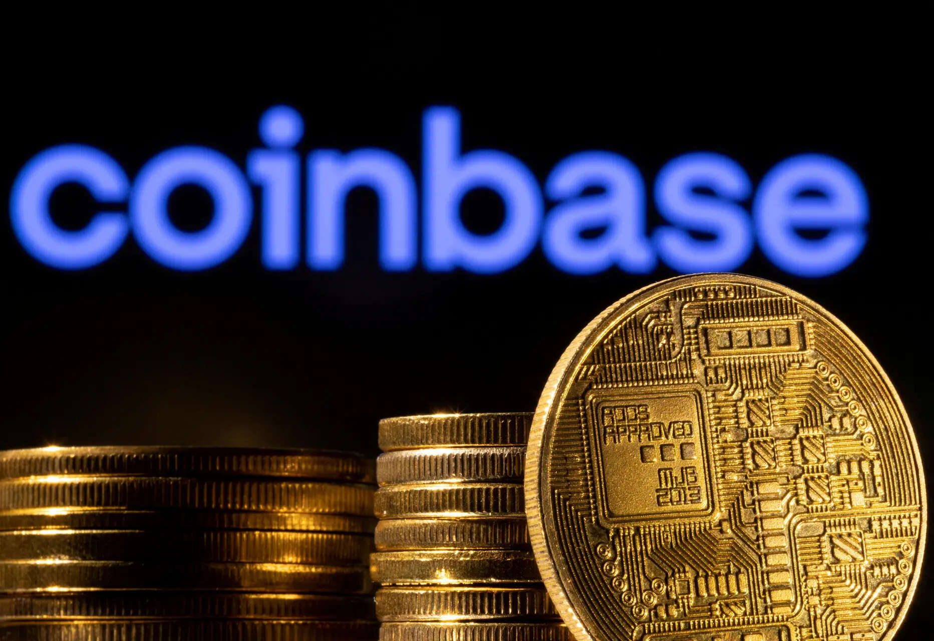 Coinbase shares take hit on quarterly loss, analysts back diversification strategy