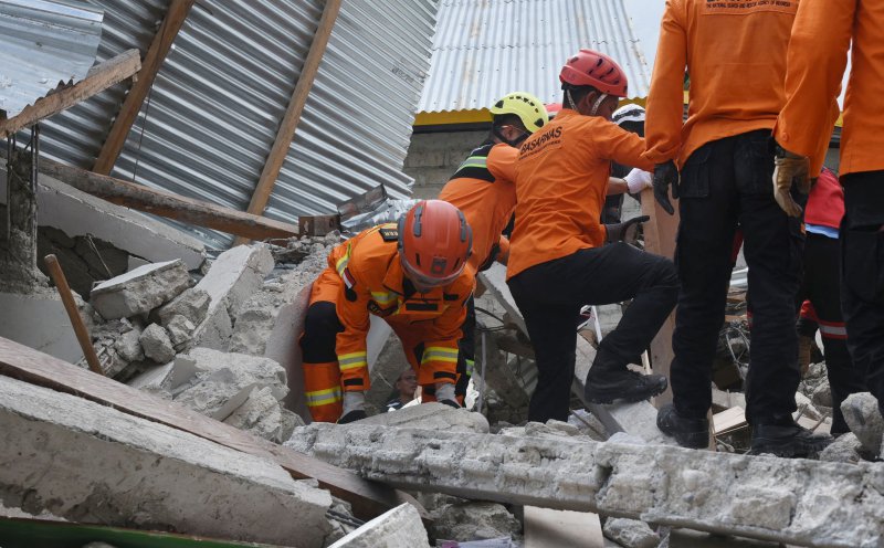 Indonesia family finds 84-year-old woman alive days after earthquake