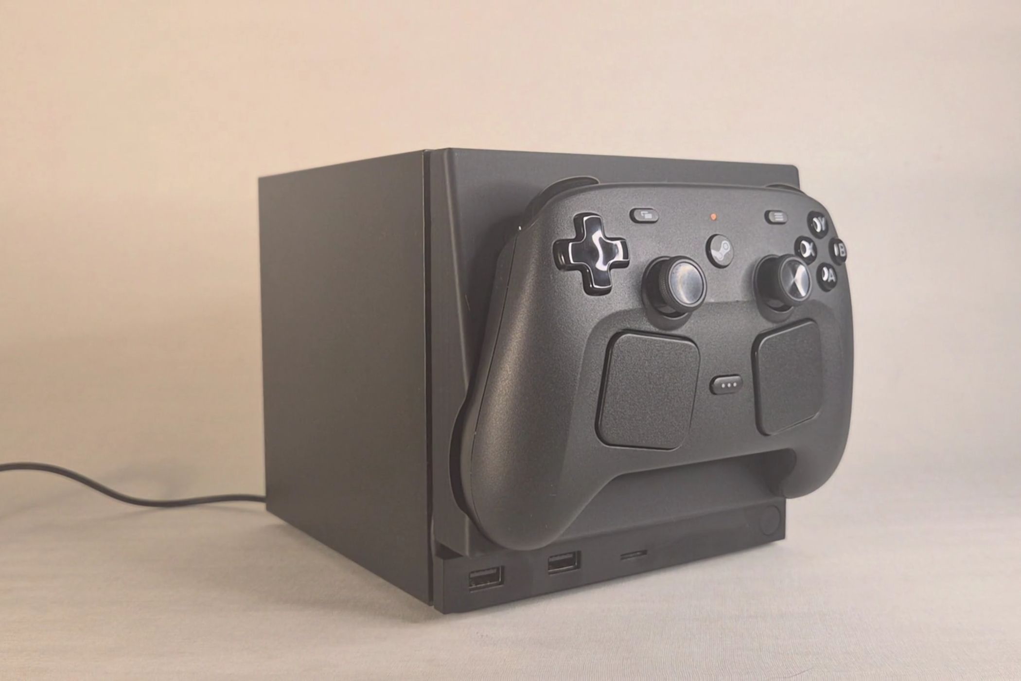 Someone built a Steam Machine face plate that lets you stick your Steam Controller onto it