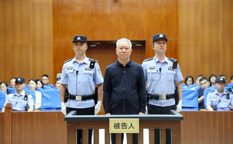 China jails founder, fines disgraced property giant Evergrande
