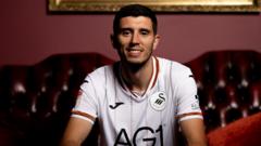 Swansea sign Scotland striker Stewart