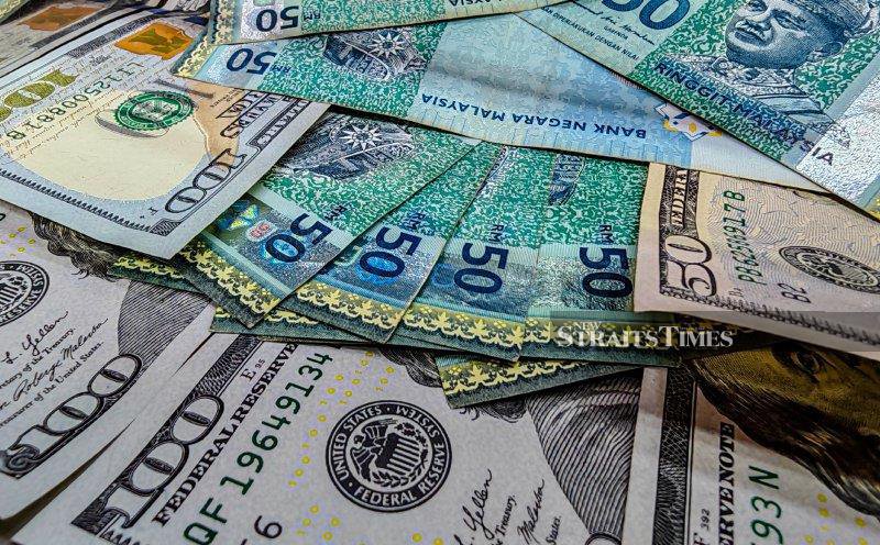 Ringgit opens higher against major currencies, ease vs US dollar