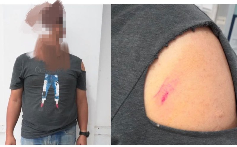 Man held after threatening police with parang during raid