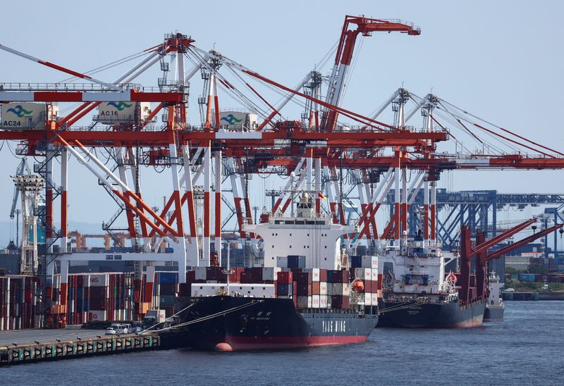 Japan's exports surge on chips demand, imports hit record on oil costs