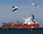 Australia news live: Surge in EV demand and fuel diplomacy push send trade surplus to nine-year low