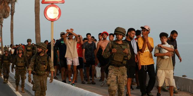 Spain installs sea barrier on Ceuta's border with Morocco after frontier rush that killed 67