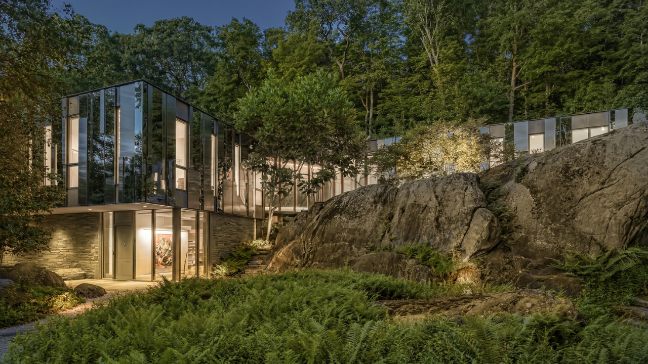 19.5-acre mirrored New York home blends into forest, lists for $15M