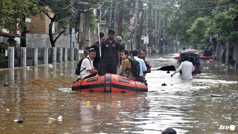 Floods in India's northeast kill nearly 100