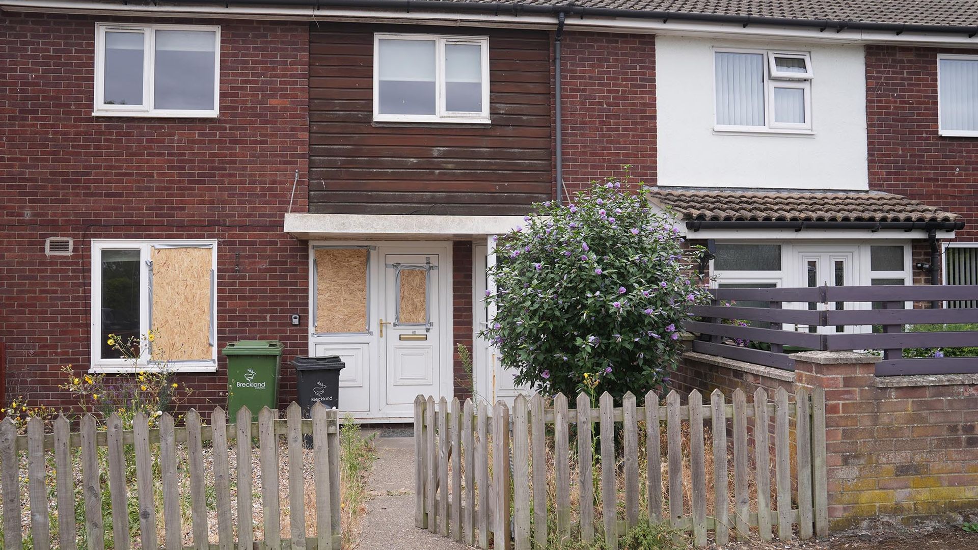 Protesters criticised by police for trying to 'kick down doors' of properties believed to house asylum seekers