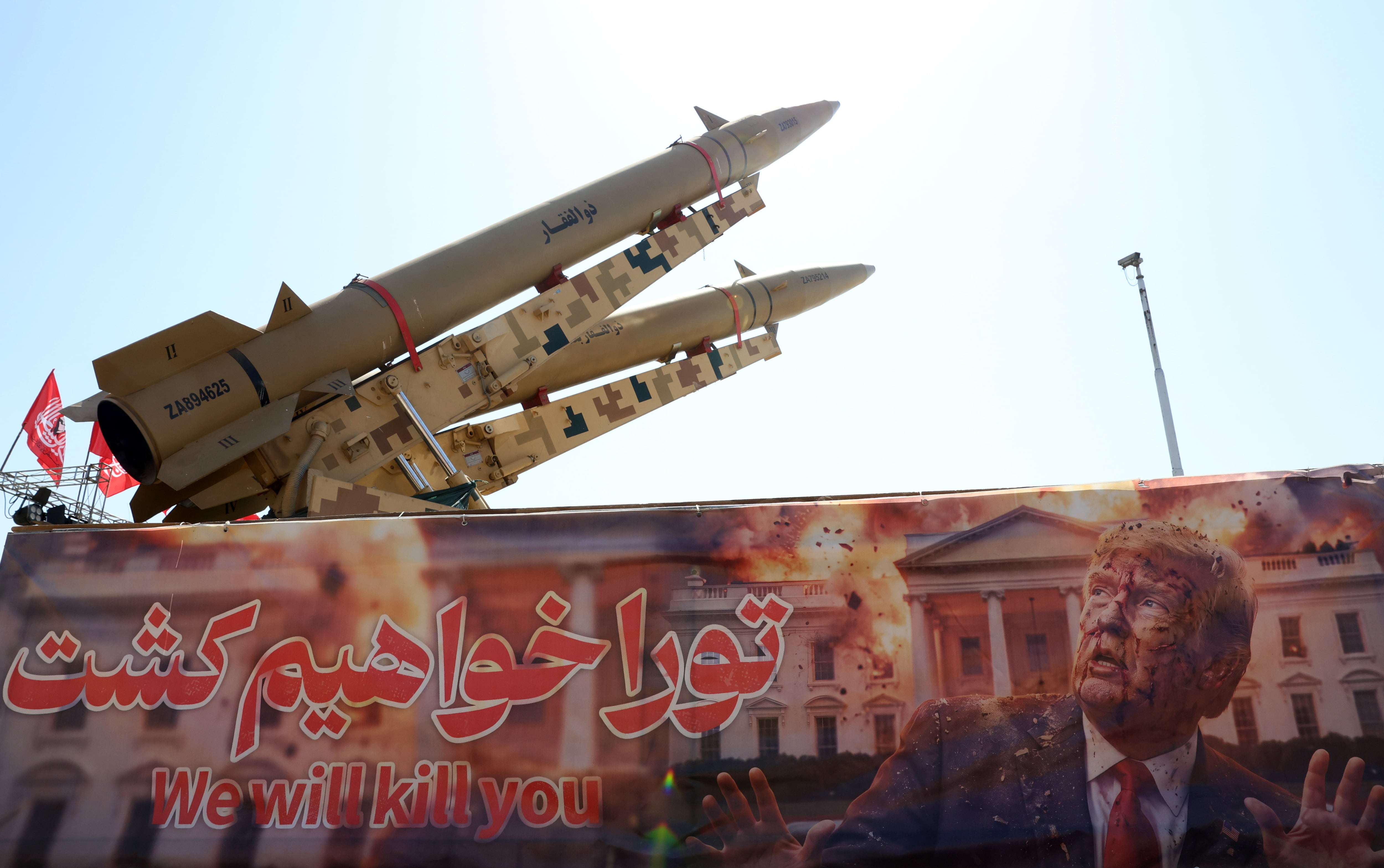 Trump halts Iran attacks and says new talks are on to open Hormuz