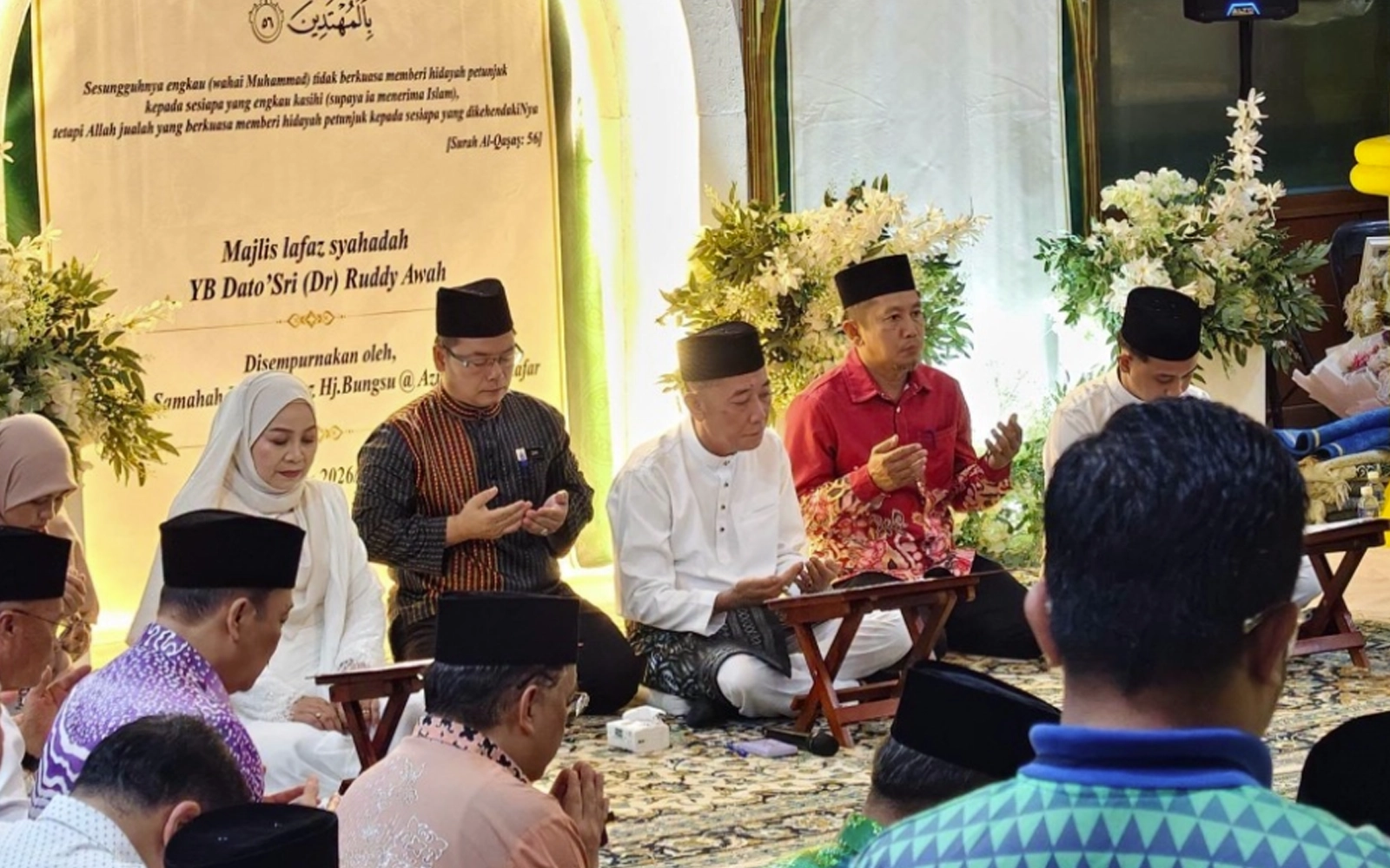 Sabah assemblyman, family embrace Islam