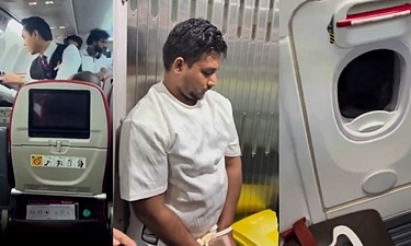 Malaysia flight passenger tries to open emergency exit, damages window panel