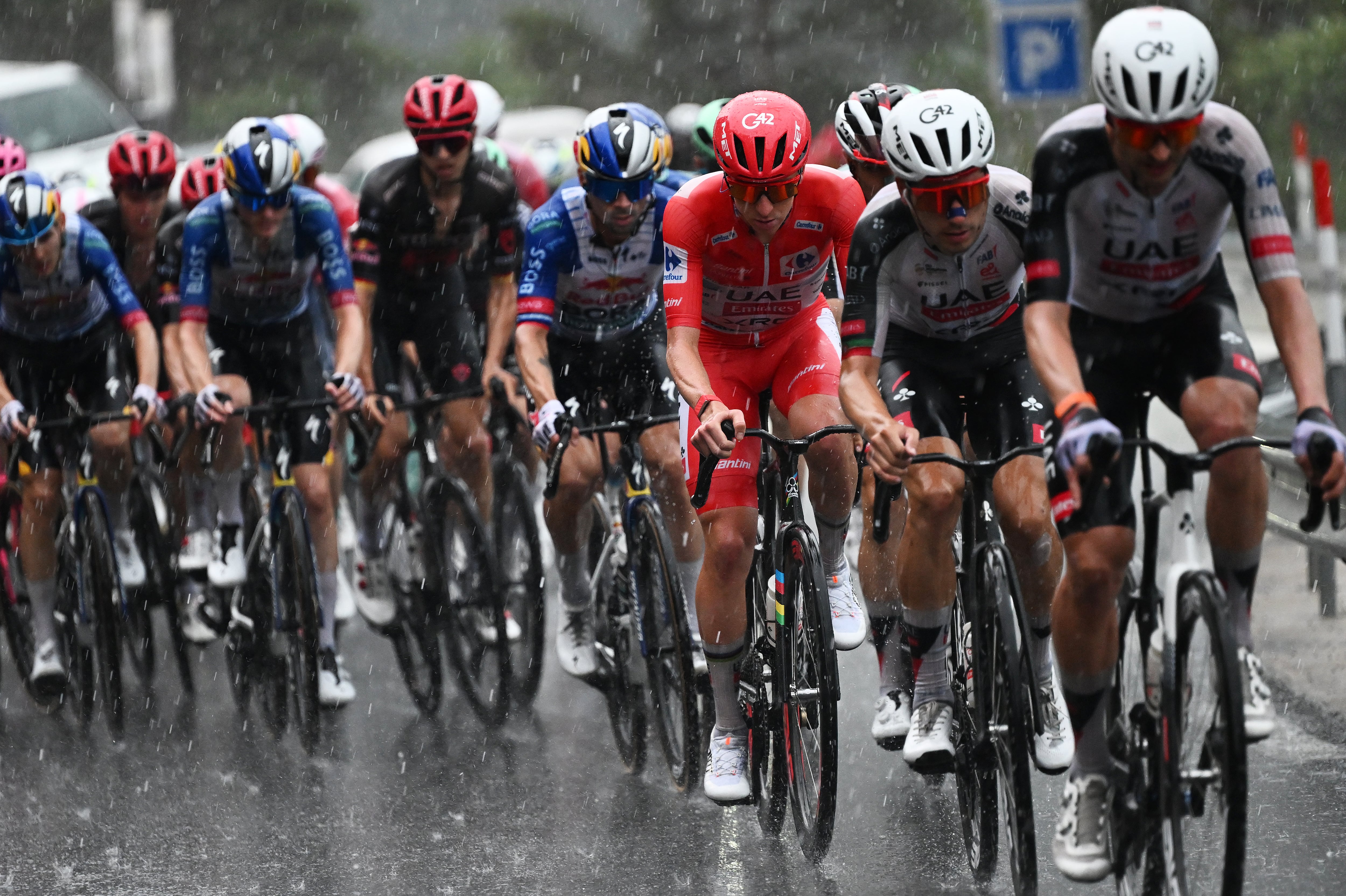Tadej Pogacar pulls over peloton as torrential hailstorm forces Vuelta a Espana stage to be abandoned