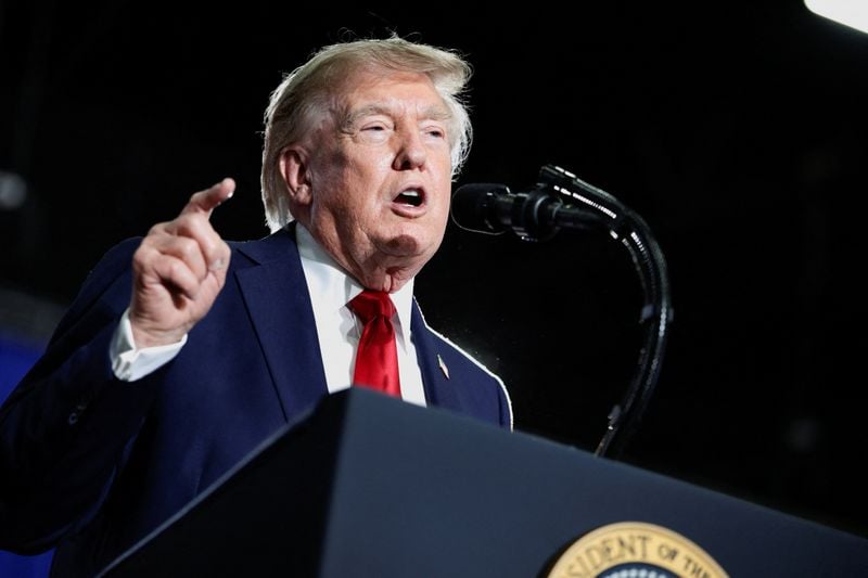 Trump threatens 50% tariffs on all cars and trucks from Canada amid trade fight
