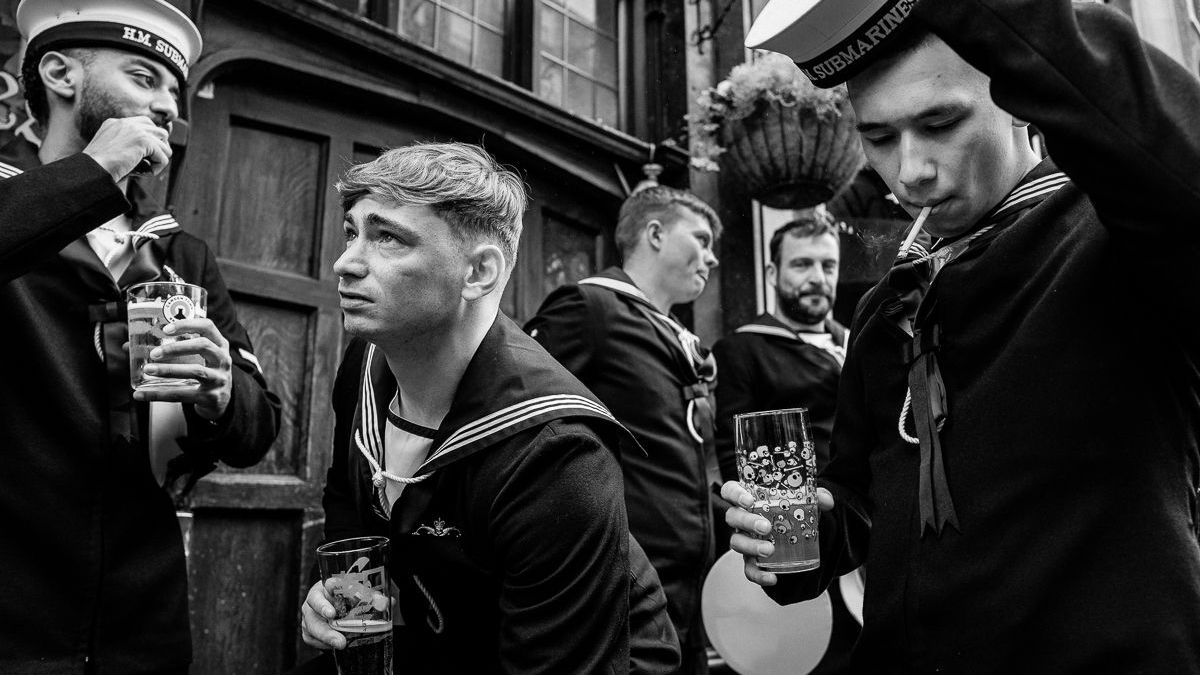"This image captures something deeply human – the need for connection after moments of reflection and duty. Just hours earlier, these young submariners had marched with solemnity and precision, paying tribute to those who had gone before them"