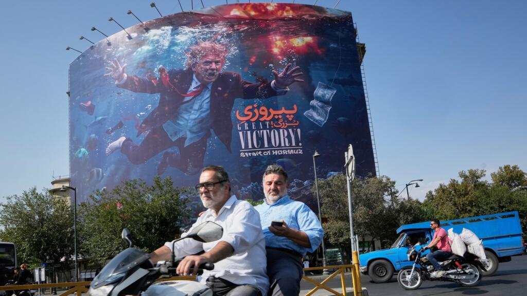 Iran threatens retaliation as new US sanctions hit already-struggling economy