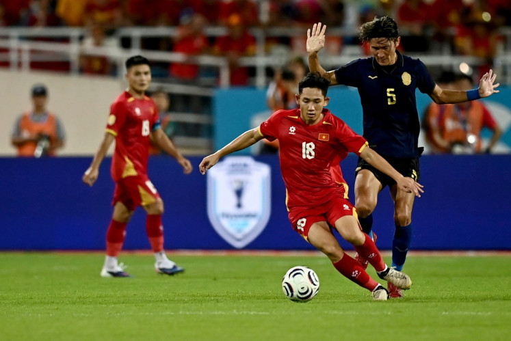 Vietnam keep title defence on track in ASEAN Championship as Singapore advance