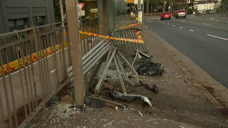 Woman charged after chaotic Sydney bus stop crash