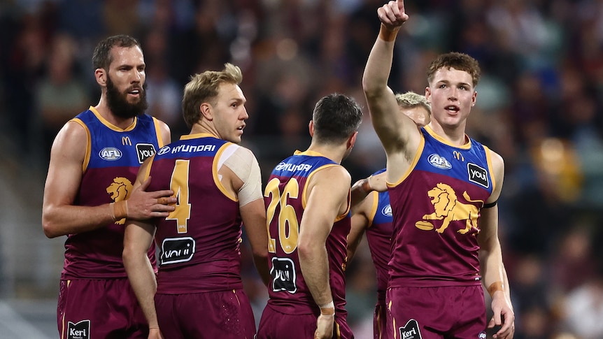 Ruthless Lions send ominous warning to AFL rivals by dismantling Hawks