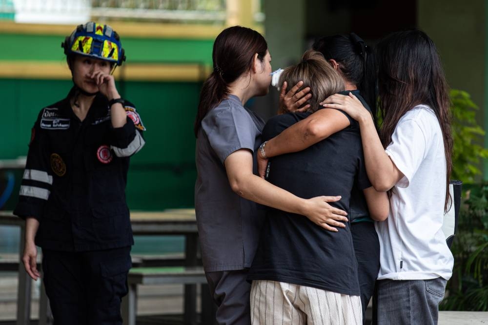 Thailand school shooting death toll rises to nine after girl dies