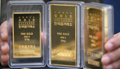 Gold prices rise 1 percent