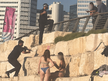 Netanyahu guards pointing assault rifles at beachgoers shows how he sees Israeli civilians