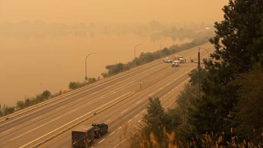 Wildfire forces more than 20,000 people evacuate homes in western Canada