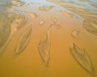 Sand overextraction weakening riverbanks as concrete demand soars