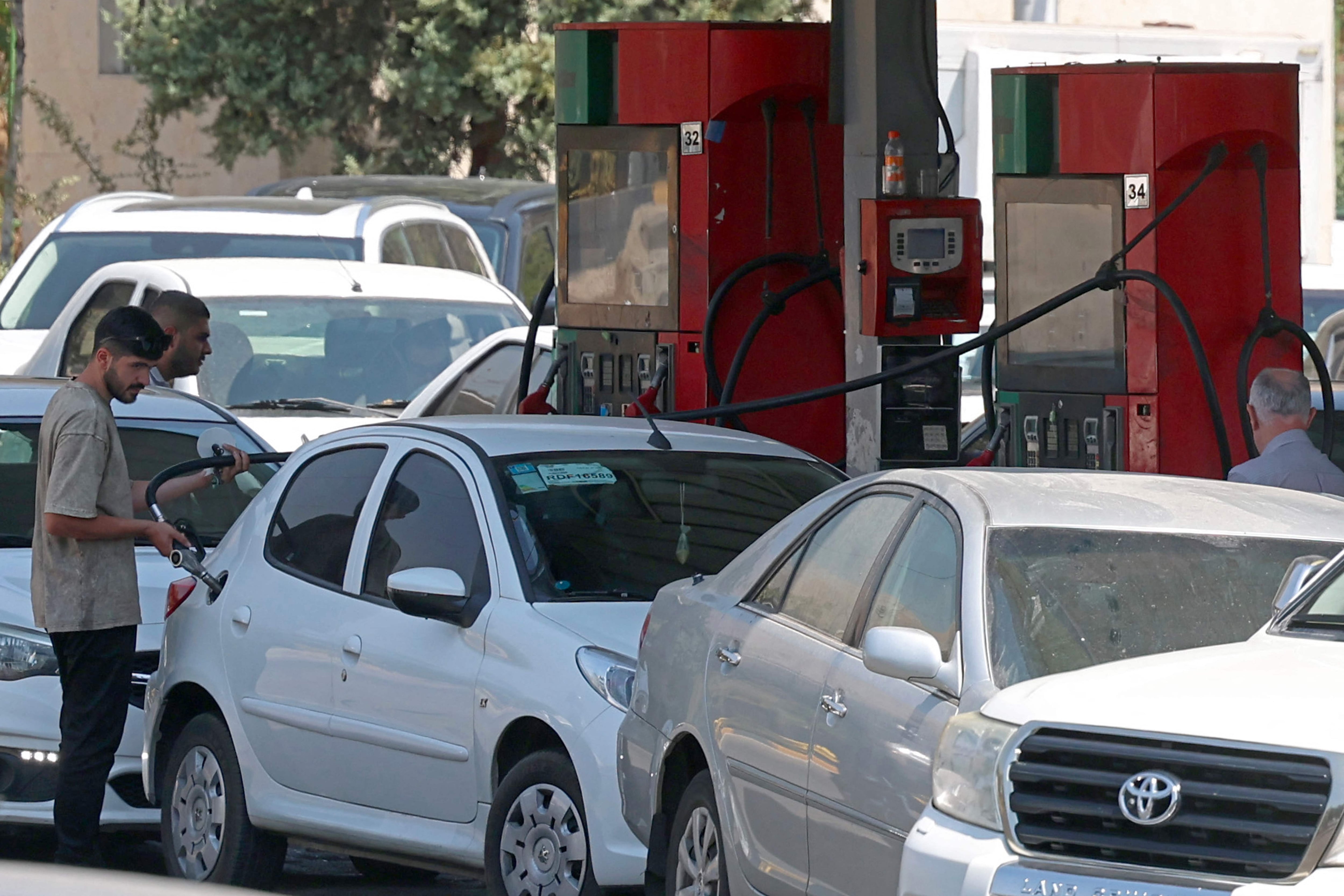 Iran suffers from fuel shortages, Syrian Kurdish force dissolves and Dubai airport traffic expected to recover
