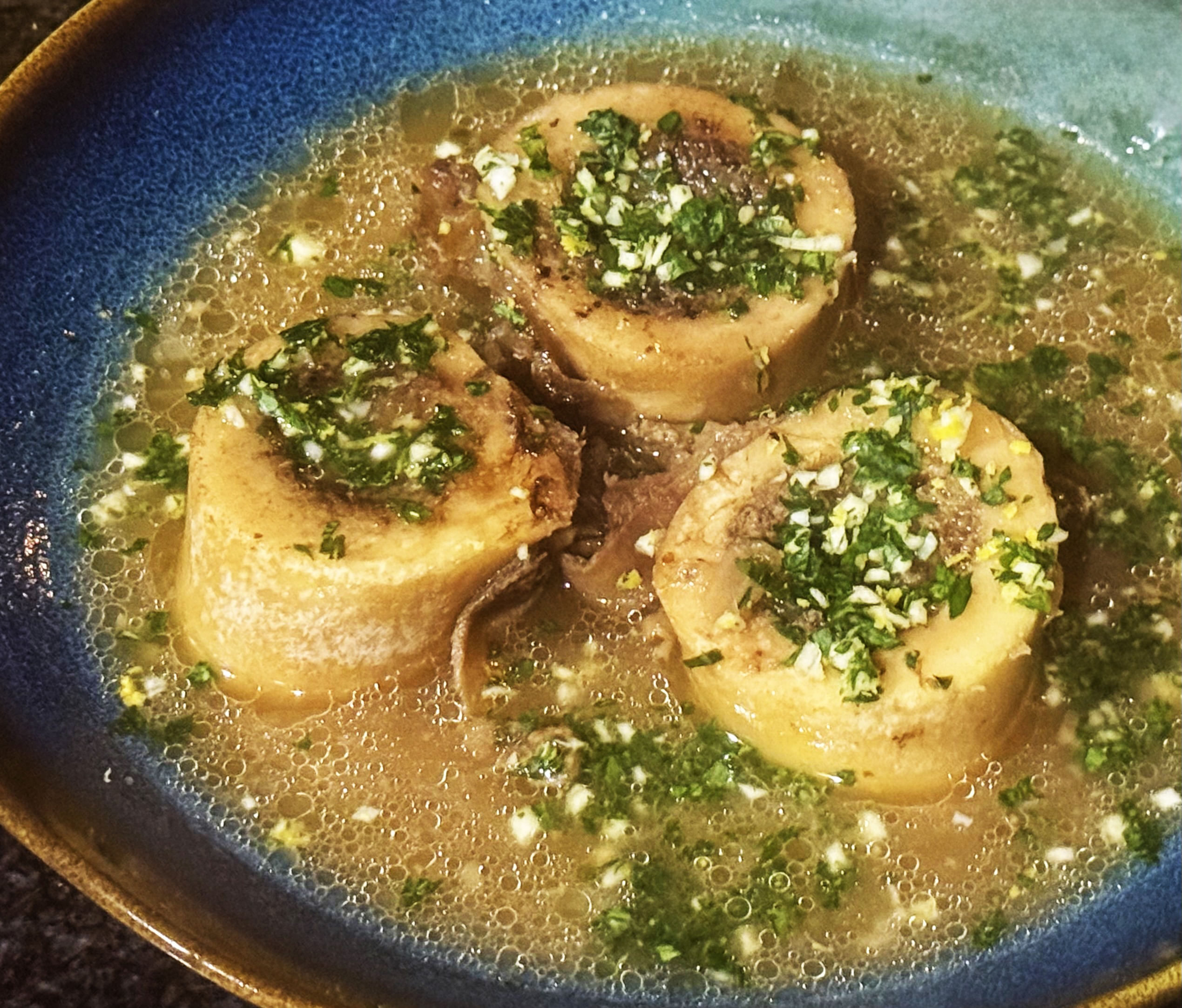 WHAT’S COOKING: Roasted marrow bones in a beef and onion broth, with gremolata
