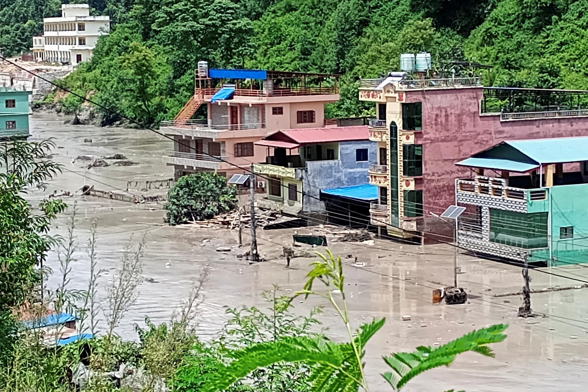Nepal flash flood kills 8, damages roads and power projects