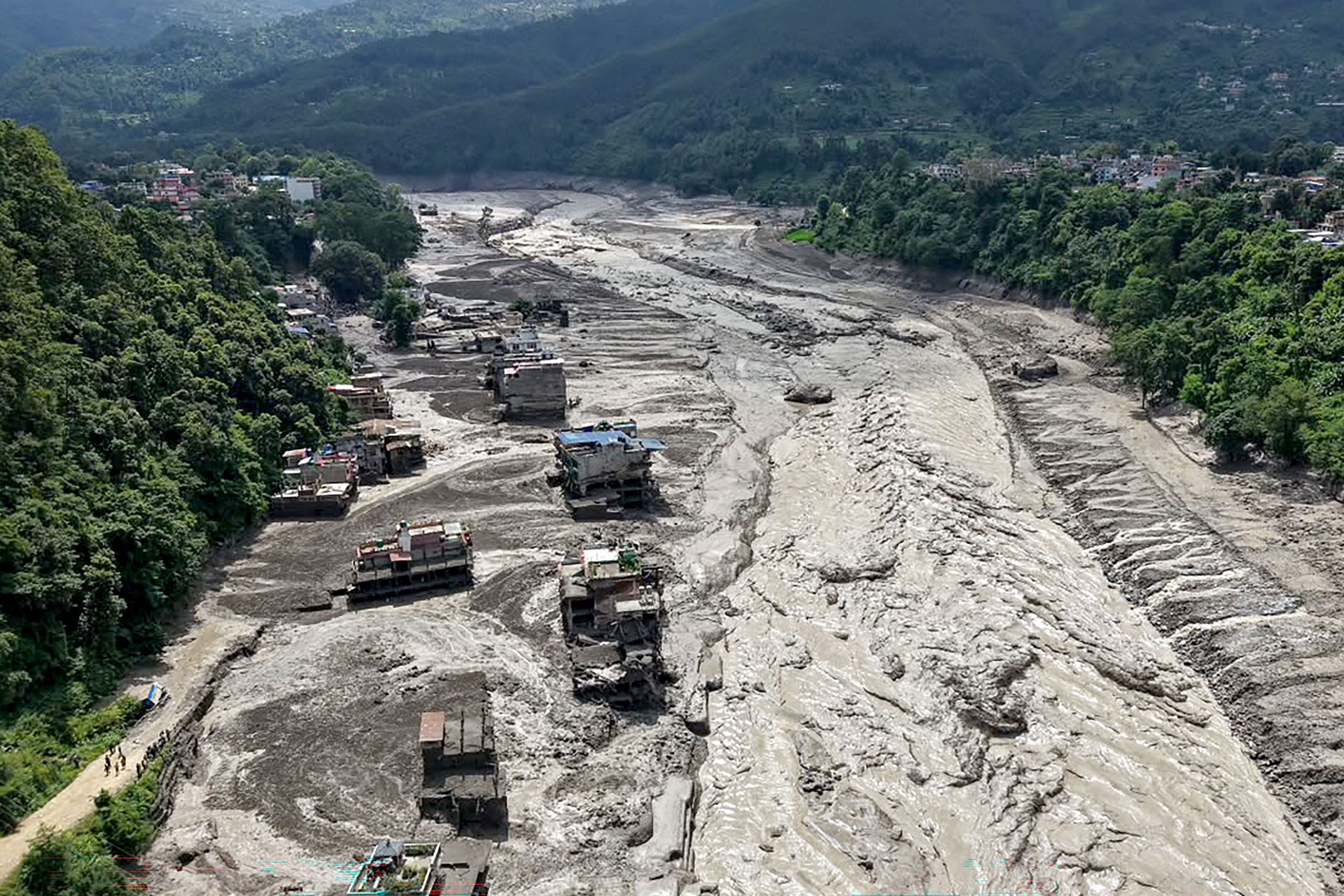 Hundreds missing, including foreign tourists, after flash floods on Nepal-Tibet border