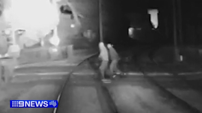 Footage shows terrifying near misses on train tracks